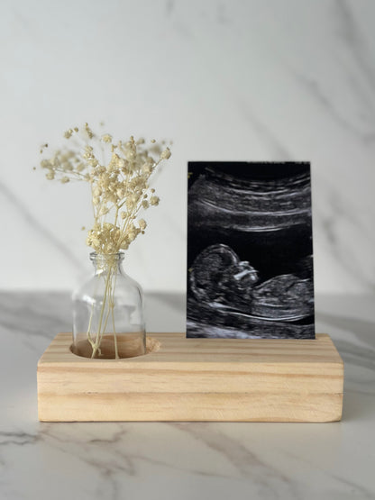 Portafoto con florero