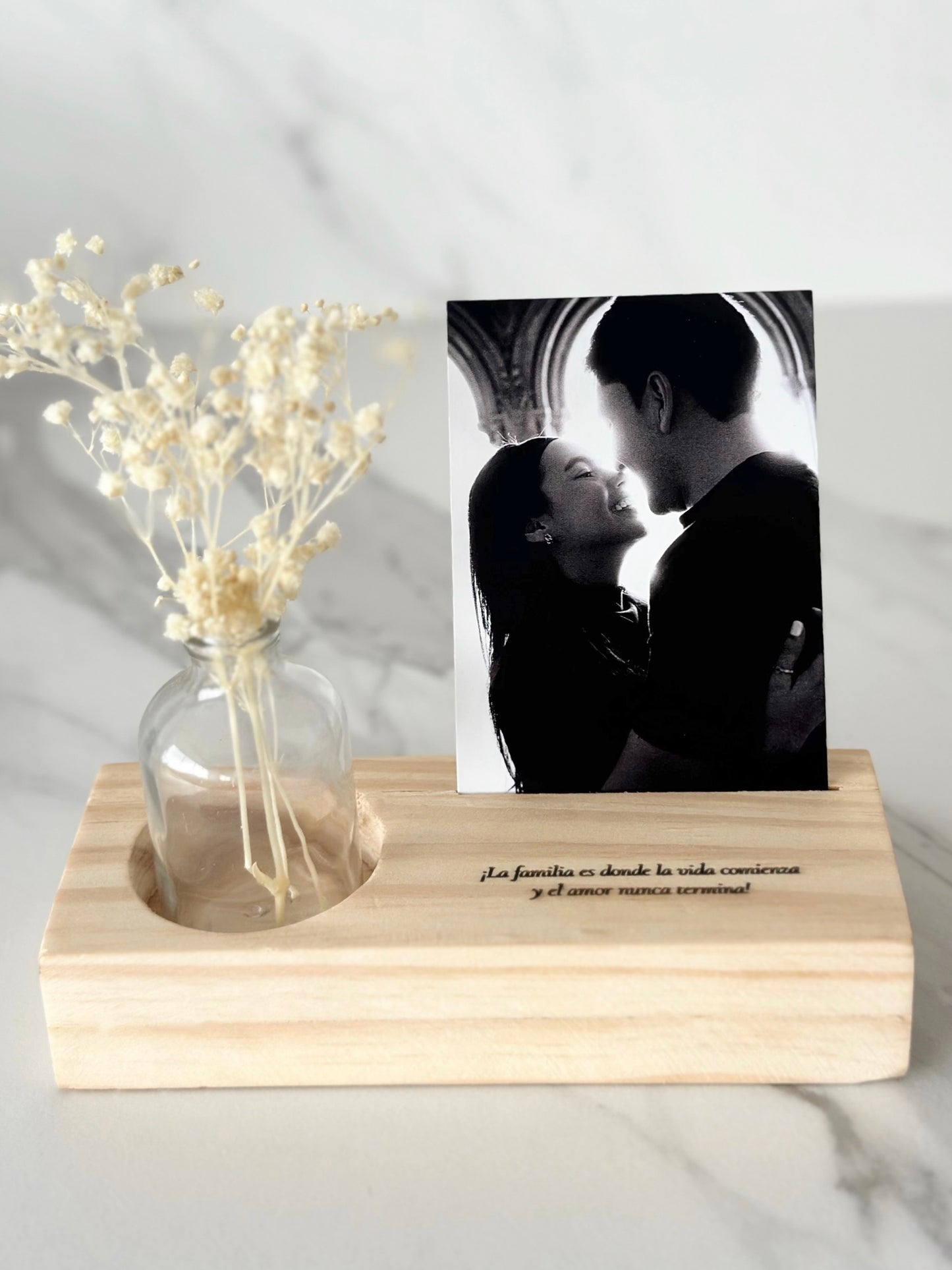 Portafoto con florero